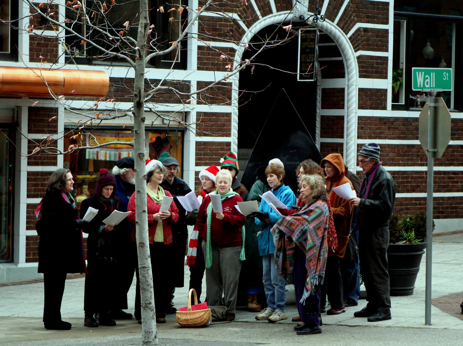 Christmas carolers sing on Wall Street in downtown Asheville.
