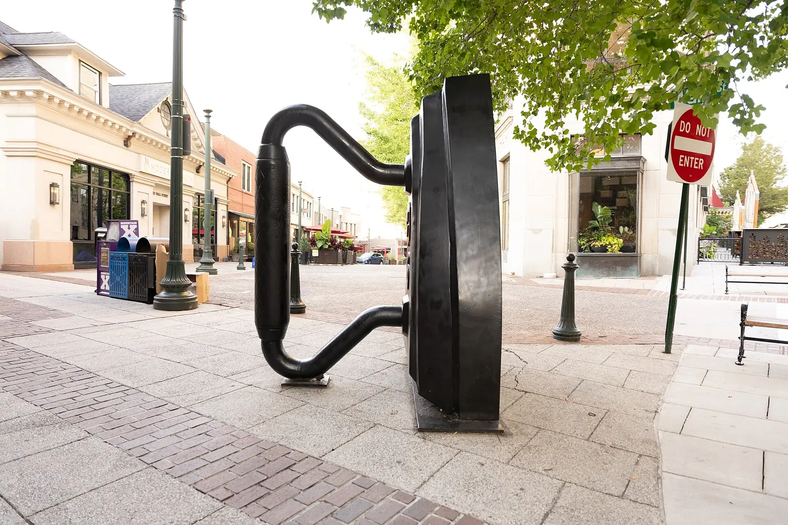 The giant flatiron sculpture on the Wall Street pedestrian street in downtown Asheville.
