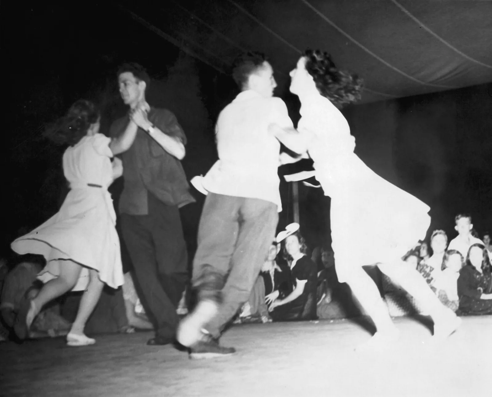 The Enka Square Dance Team dances at Asheville's mountain music festival in a photograph by John and Ruby Lomax.