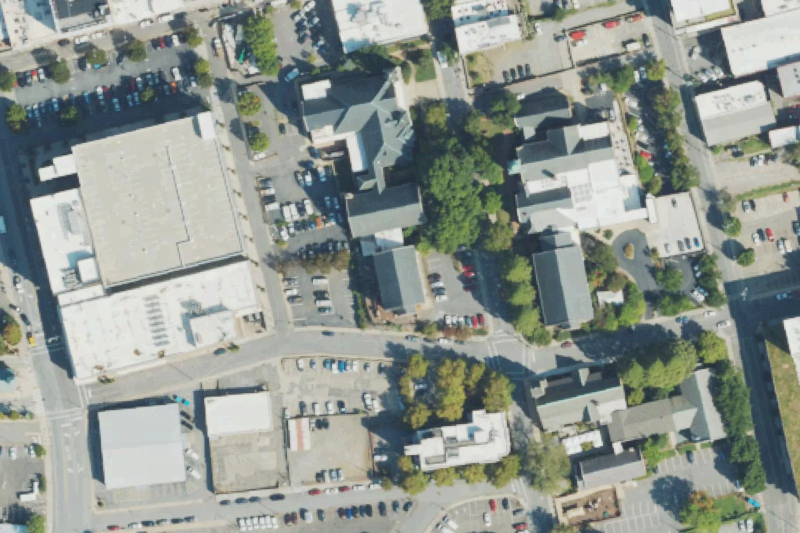 The Church Street block in downtown Asheville where Mountain City Public Montessori meets in Central United Methodist Church's education building, seen from the air