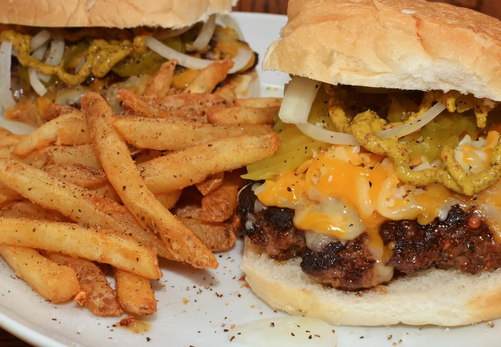 A cheeseburger with fries in a basket, an example of the dish; the photo was not taken in Asheville.
